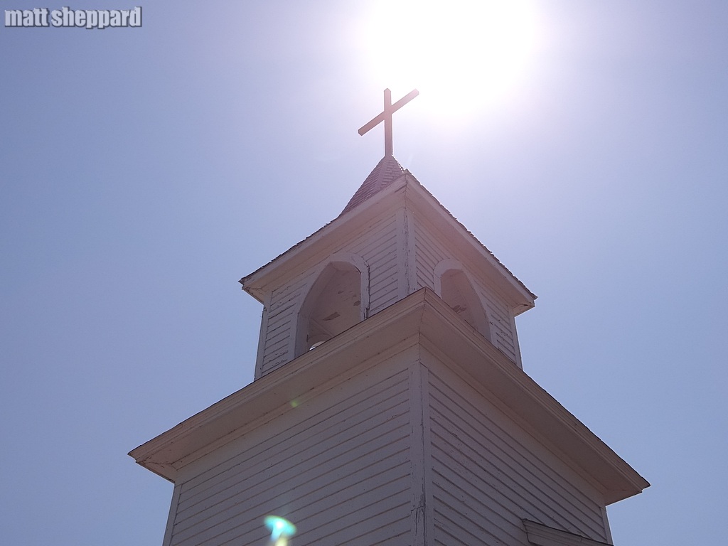 Sun shines on the Frontier Church at Frontier Village. 